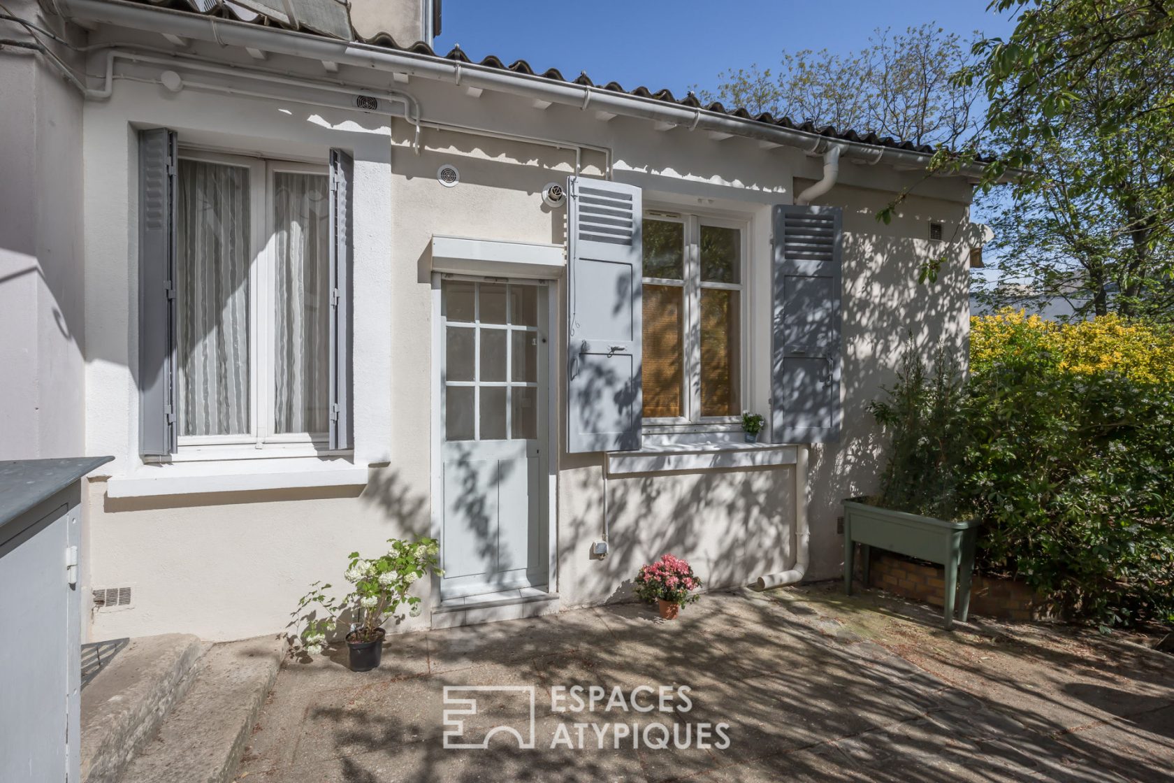 Appartement traversant avec jardin