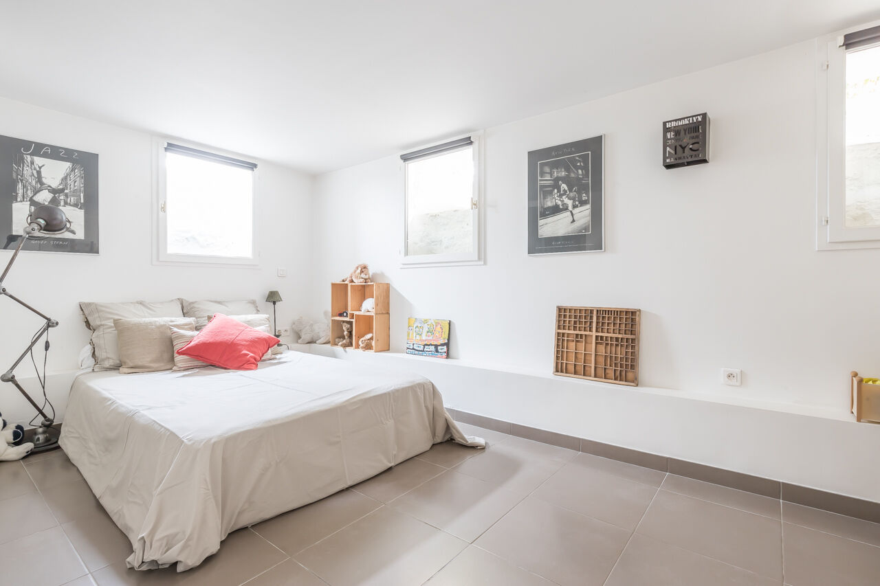 Former painting workshop transformed into a loft with patio and terrace