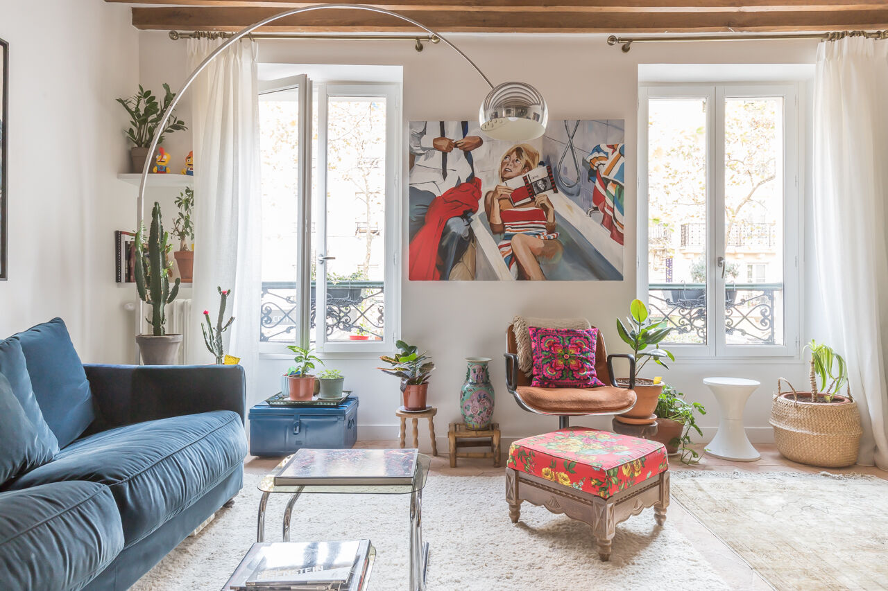 Family apartment with exposed beams
