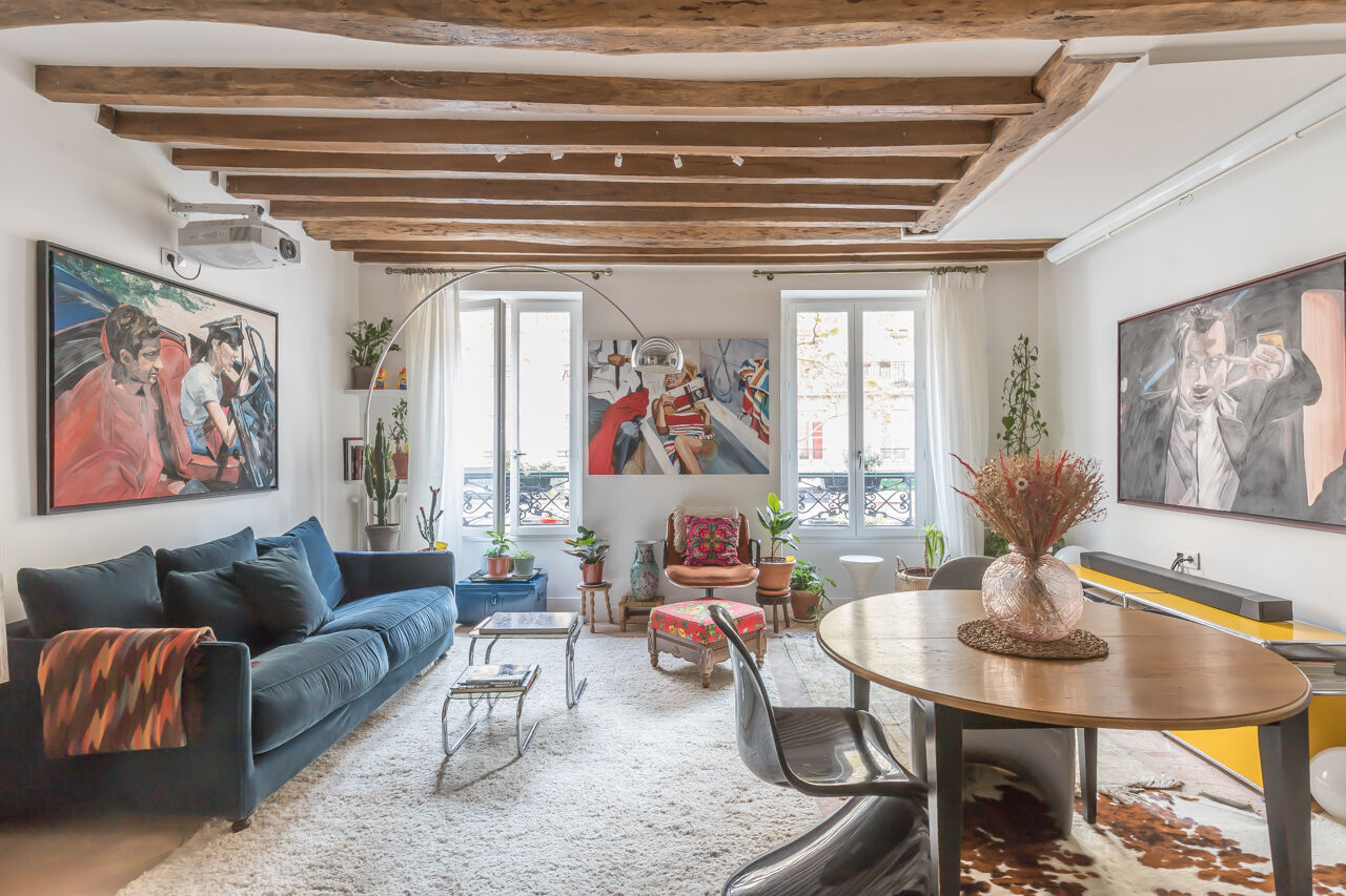 Family apartment with exposed beams