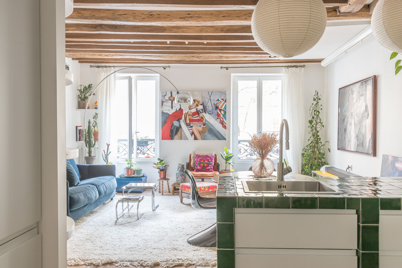 Family apartment with exposed beams