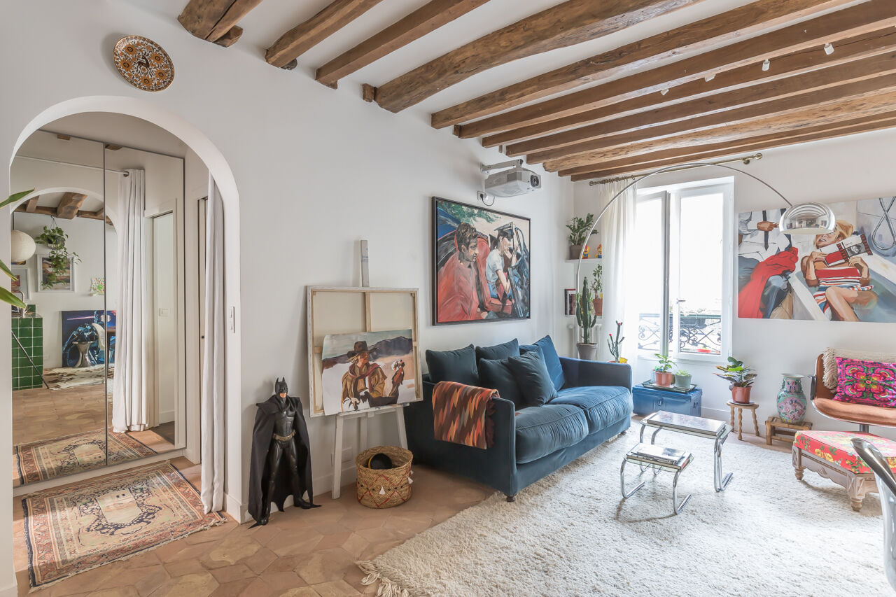Family apartment with exposed beams