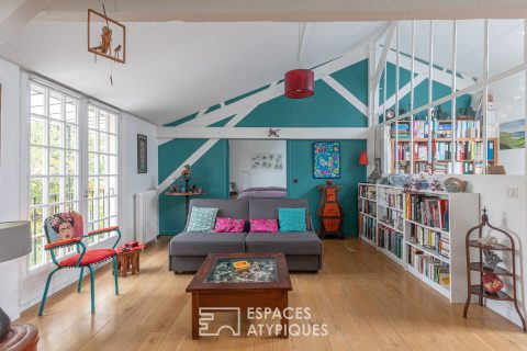 Loft with suspended terrace in a former limonaderie