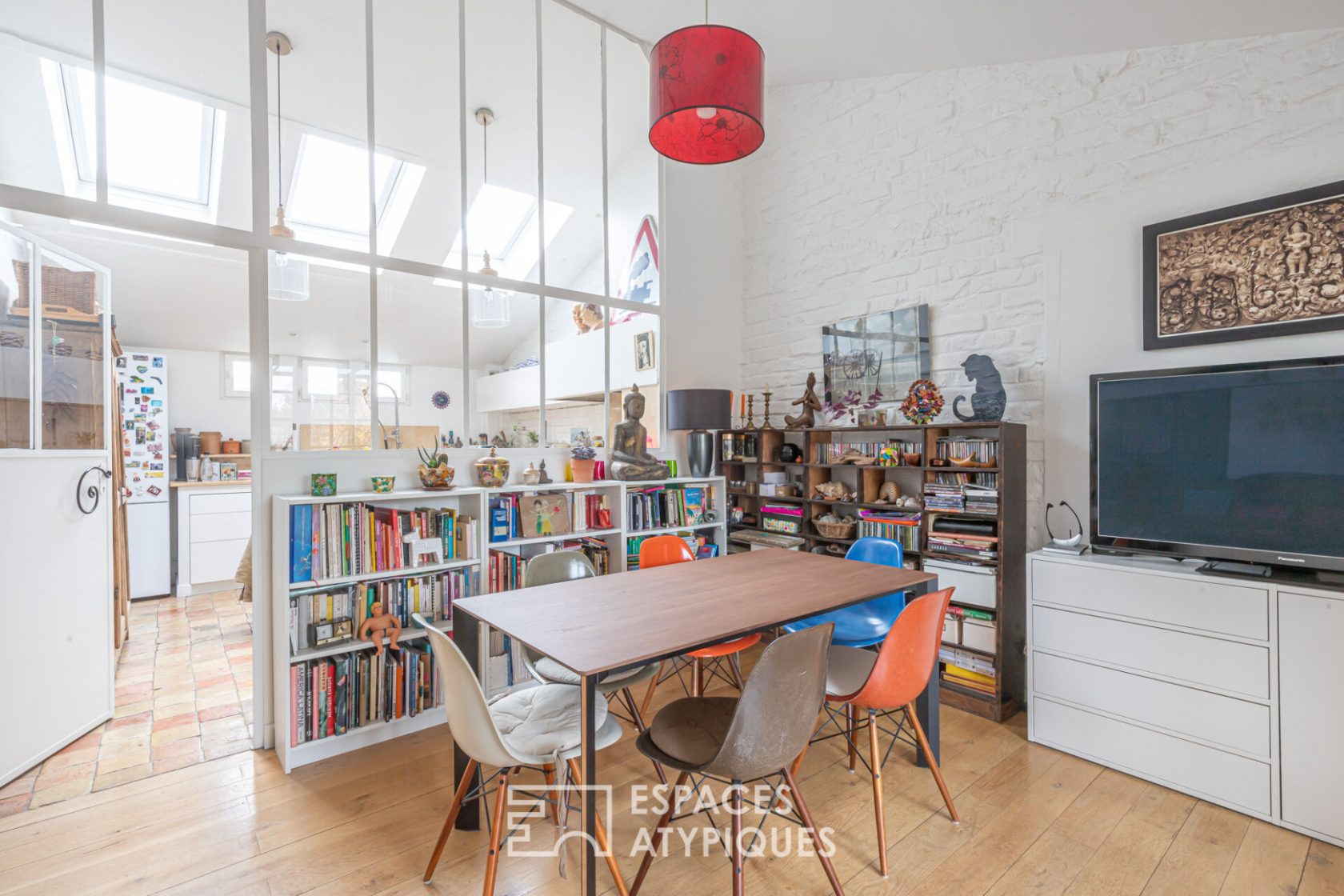 Loft with suspended terrace in a former limonaderie