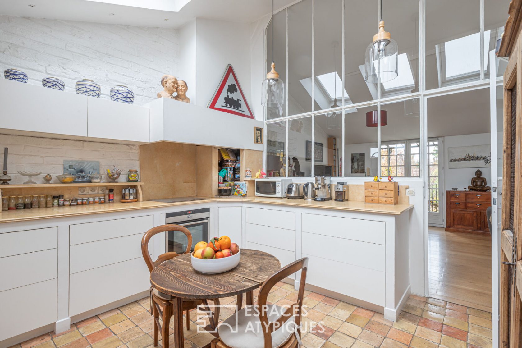 Loft with suspended terrace in a former limonaderie