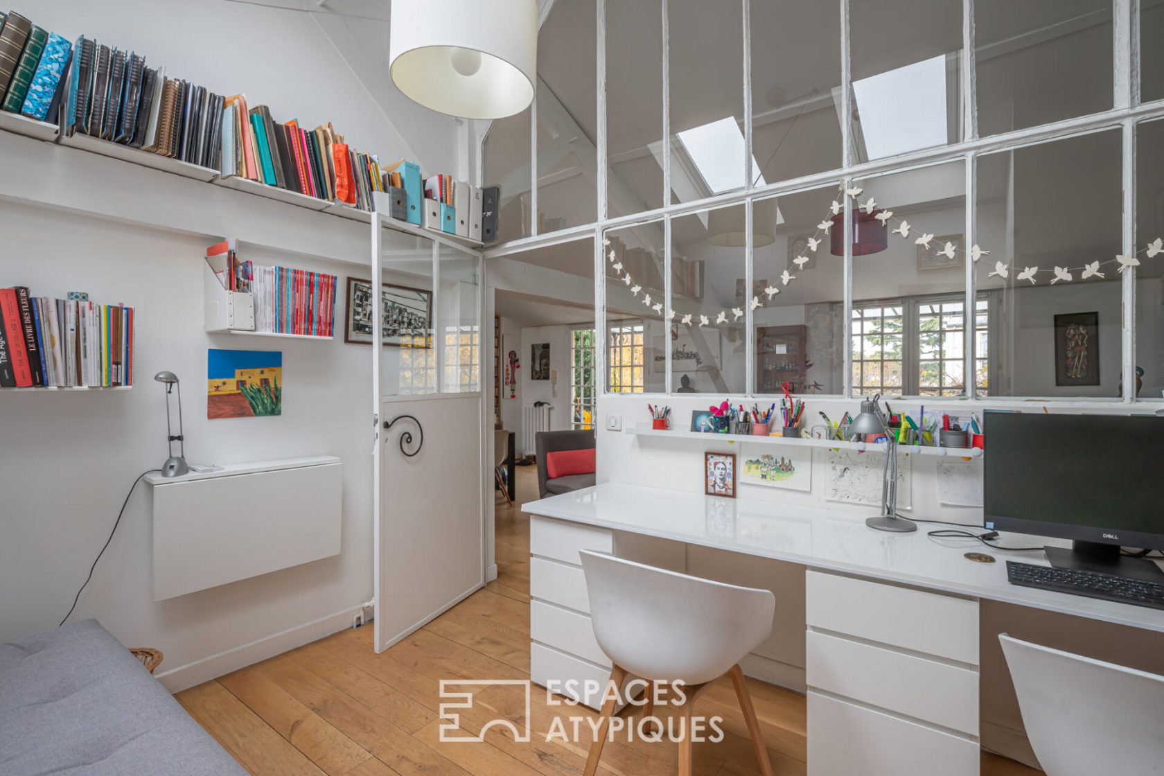 Loft with suspended terrace in a former limonaderie