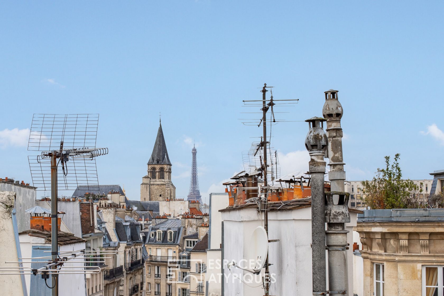 Rooftop duplex with terrace and view over the rooftops