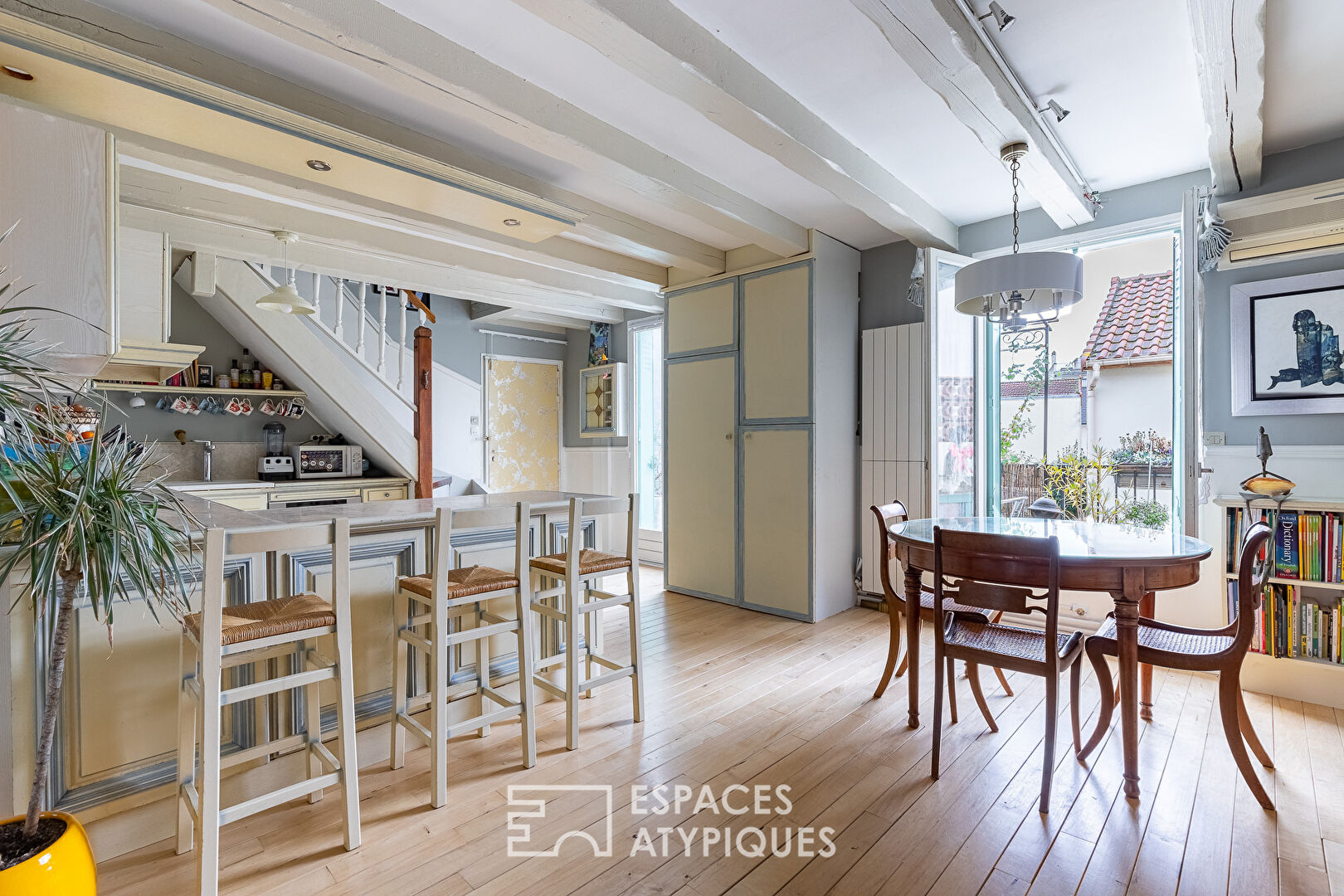 Duplex traversant avec terrasse en coeur de ville