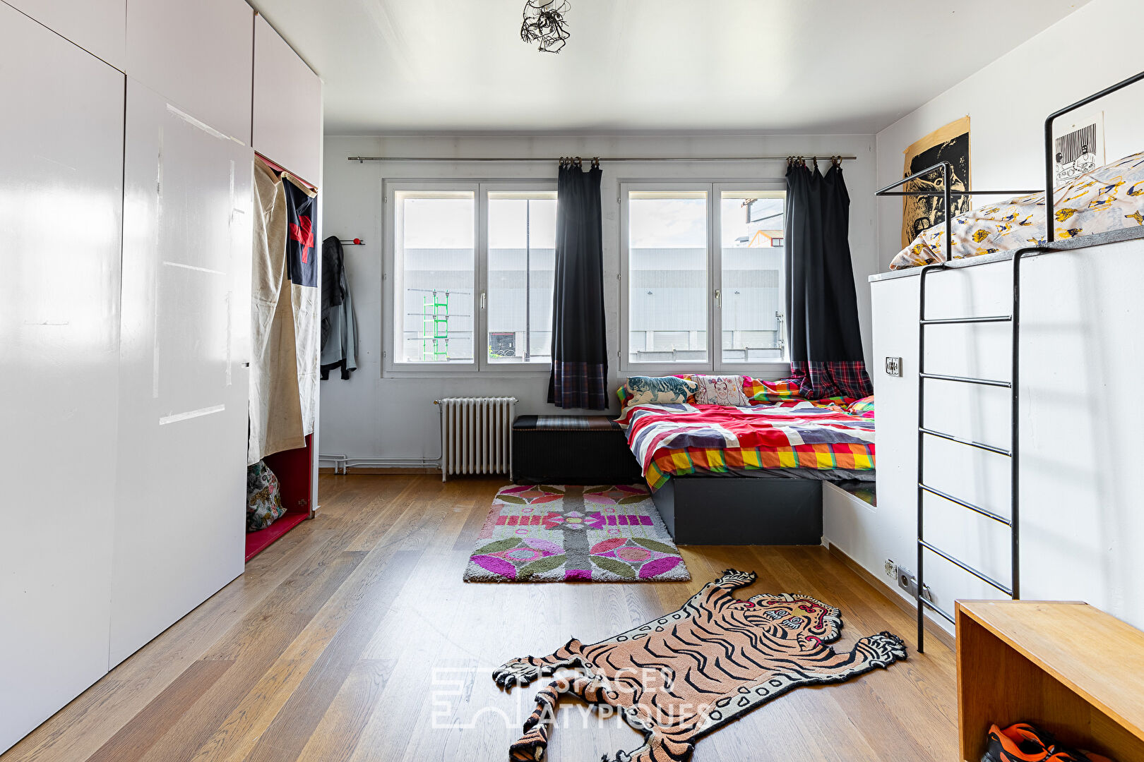 Loft en duplex avec deux terrasses dans une ancienne usine