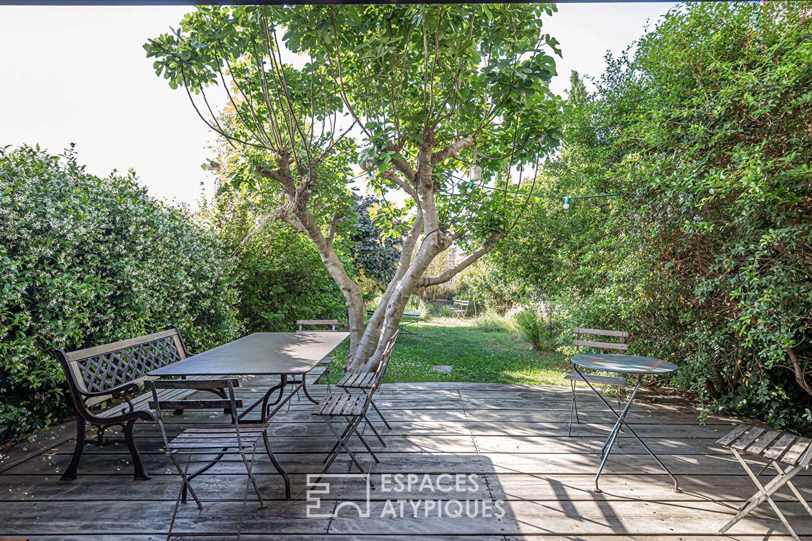 Maison avec jardin repensée par architecte