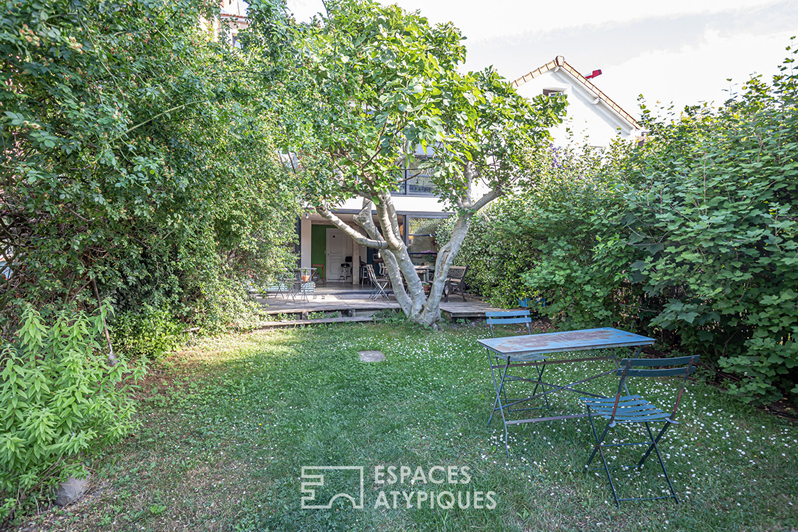 Maison avec jardin repensée par architecte