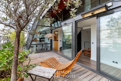 DÉJÀ LOUÉ : Duplex avec verrière et terrasses en dernier étage