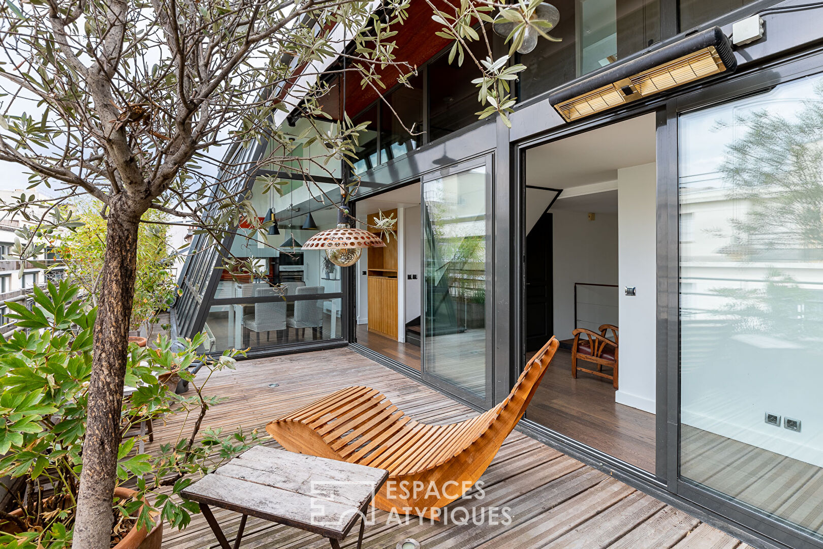 DÉJÀ LOUÉ : Duplex avec verrière et terrasses en dernier étage