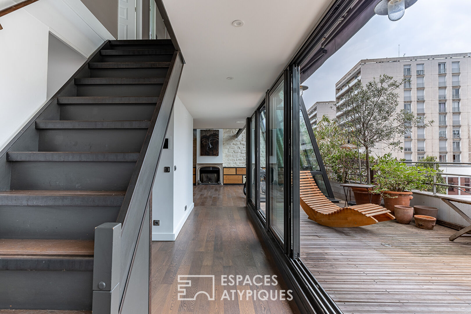DÉJÀ LOUÉ : Duplex avec verrière et terrasses en dernier étage