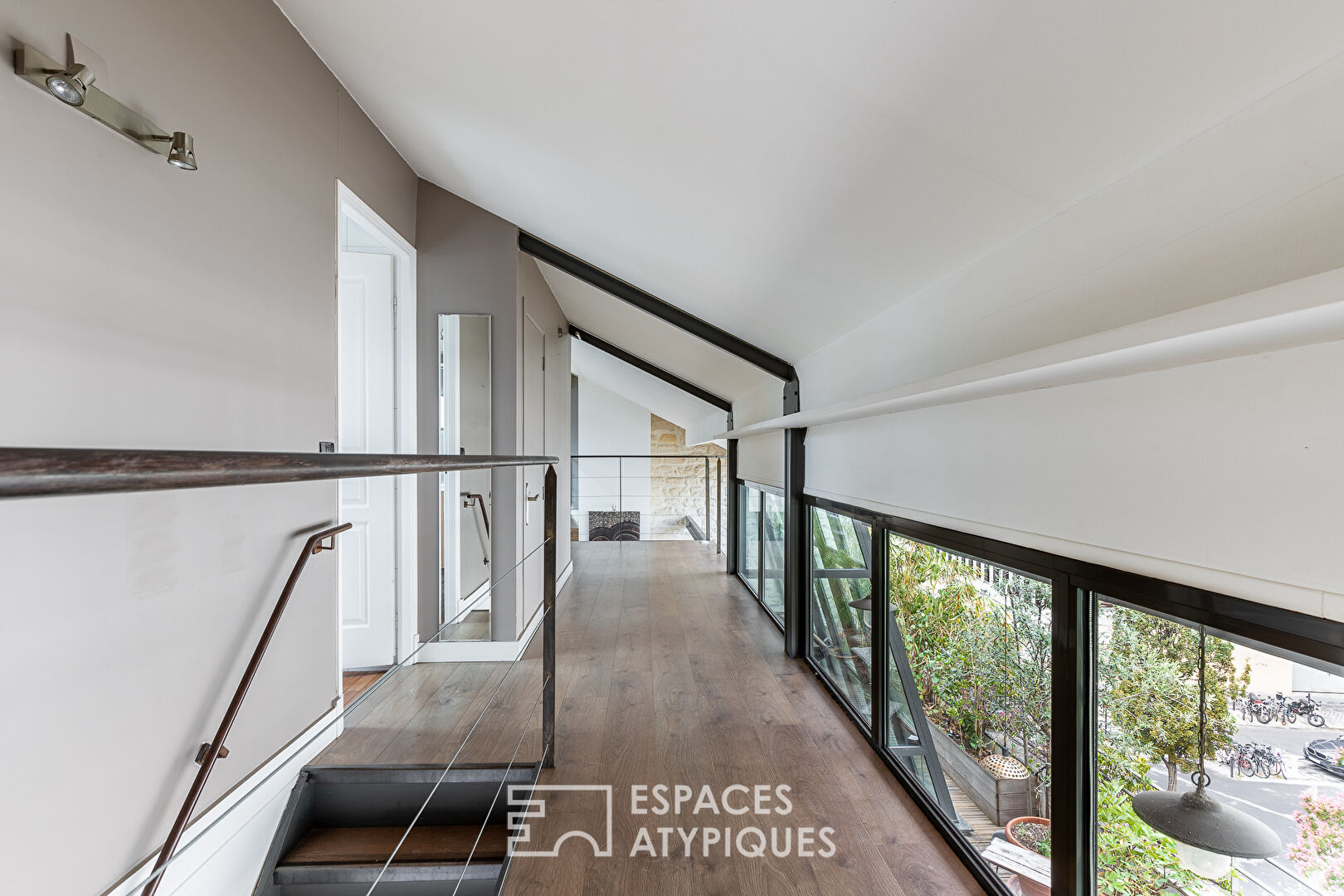 DÉJÀ LOUÉ : Duplex avec verrière et terrasses en dernier étage