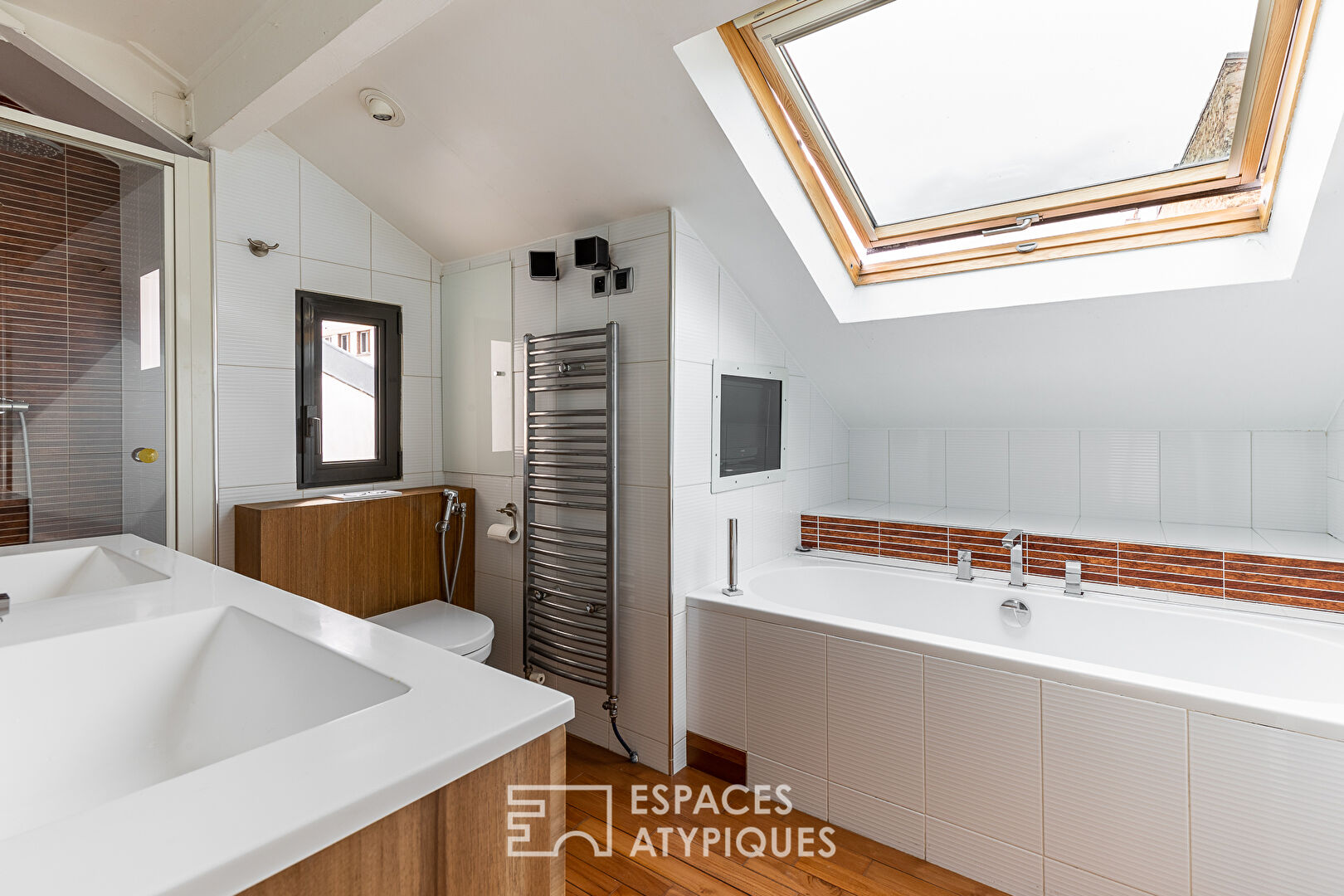 DÉJÀ LOUÉ : Duplex avec verrière et terrasses en dernier étage