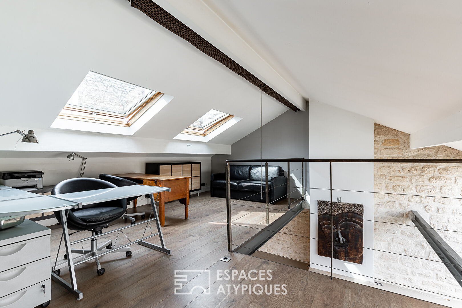 DÉJÀ LOUÉ : Duplex avec verrière et terrasses en dernier étage