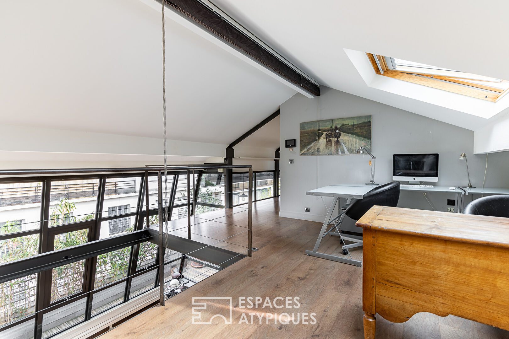 DÉJÀ LOUÉ : Duplex avec verrière et terrasses en dernier étage