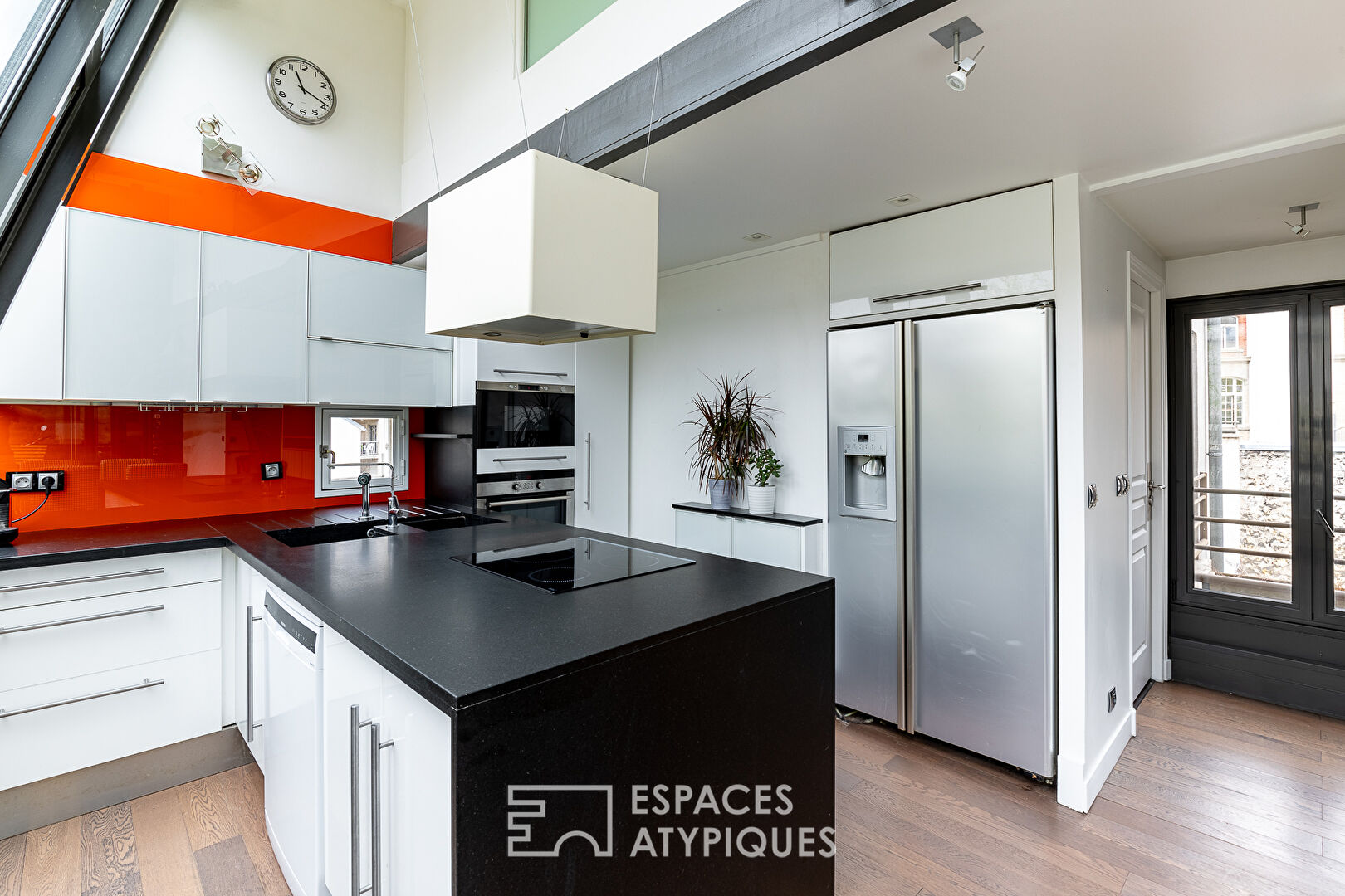 DÉJÀ LOUÉ : Duplex avec verrière et terrasses en dernier étage