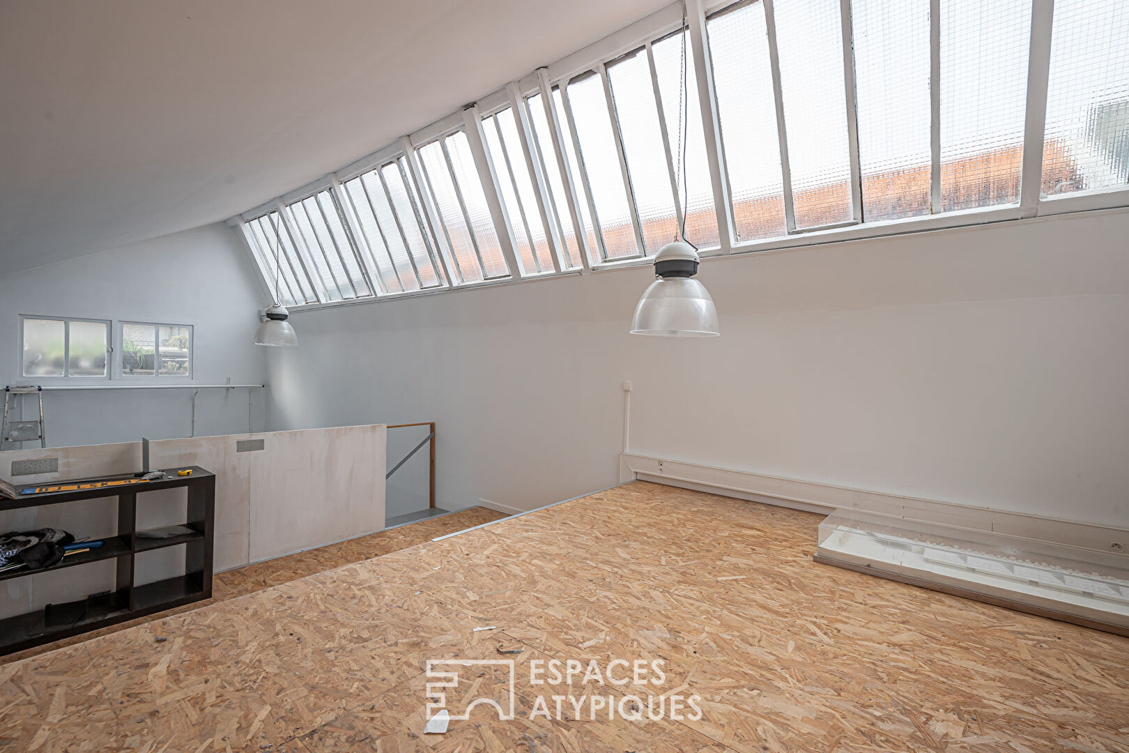 Ancien atelier avec toit terrasse