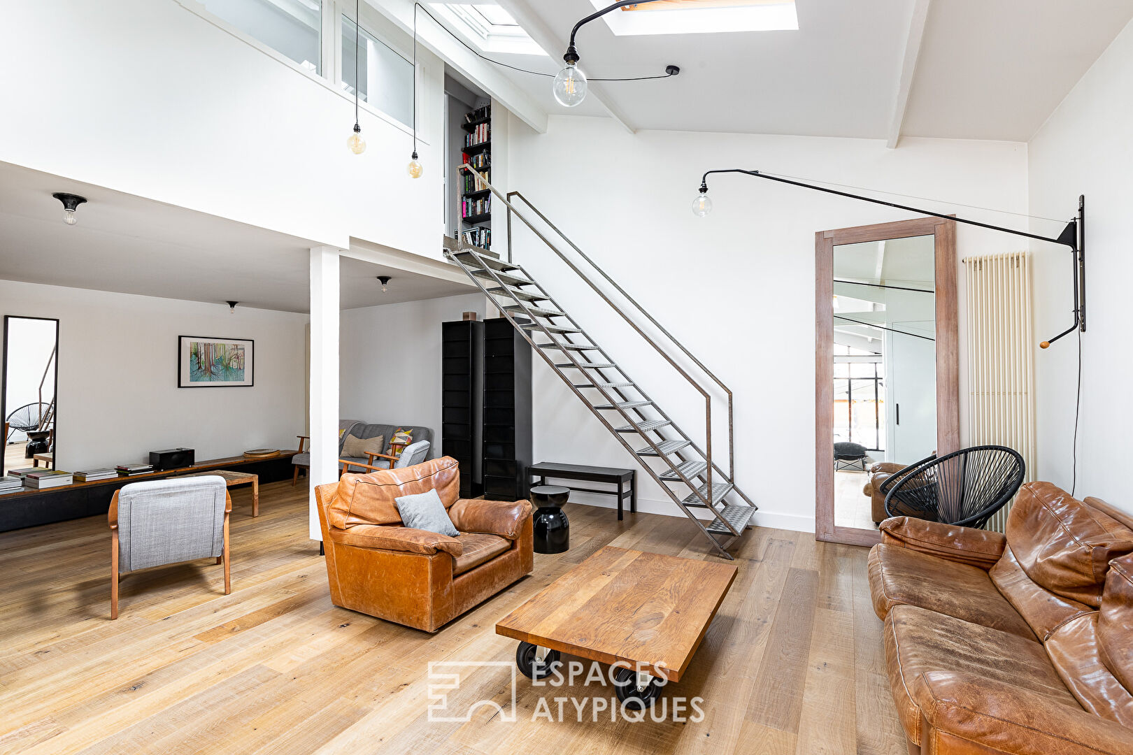 Former cabinetmaker’s workshop transformed into a family loft.