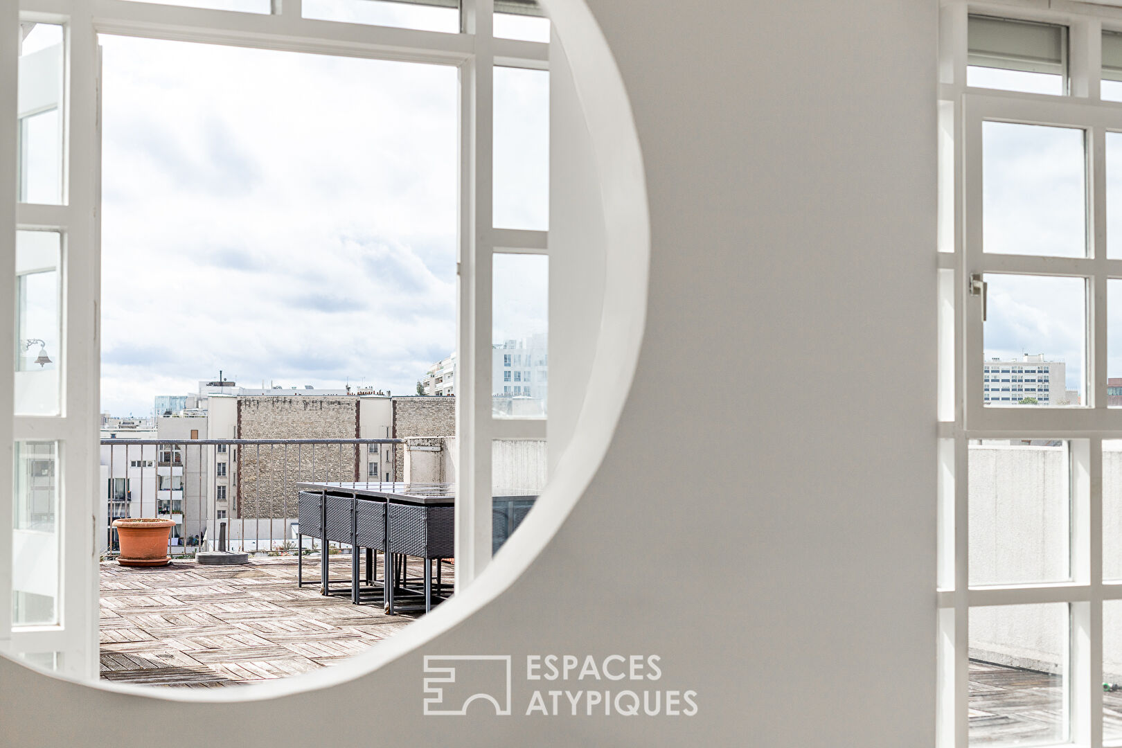 Triplex avec terrasse en dernier étage