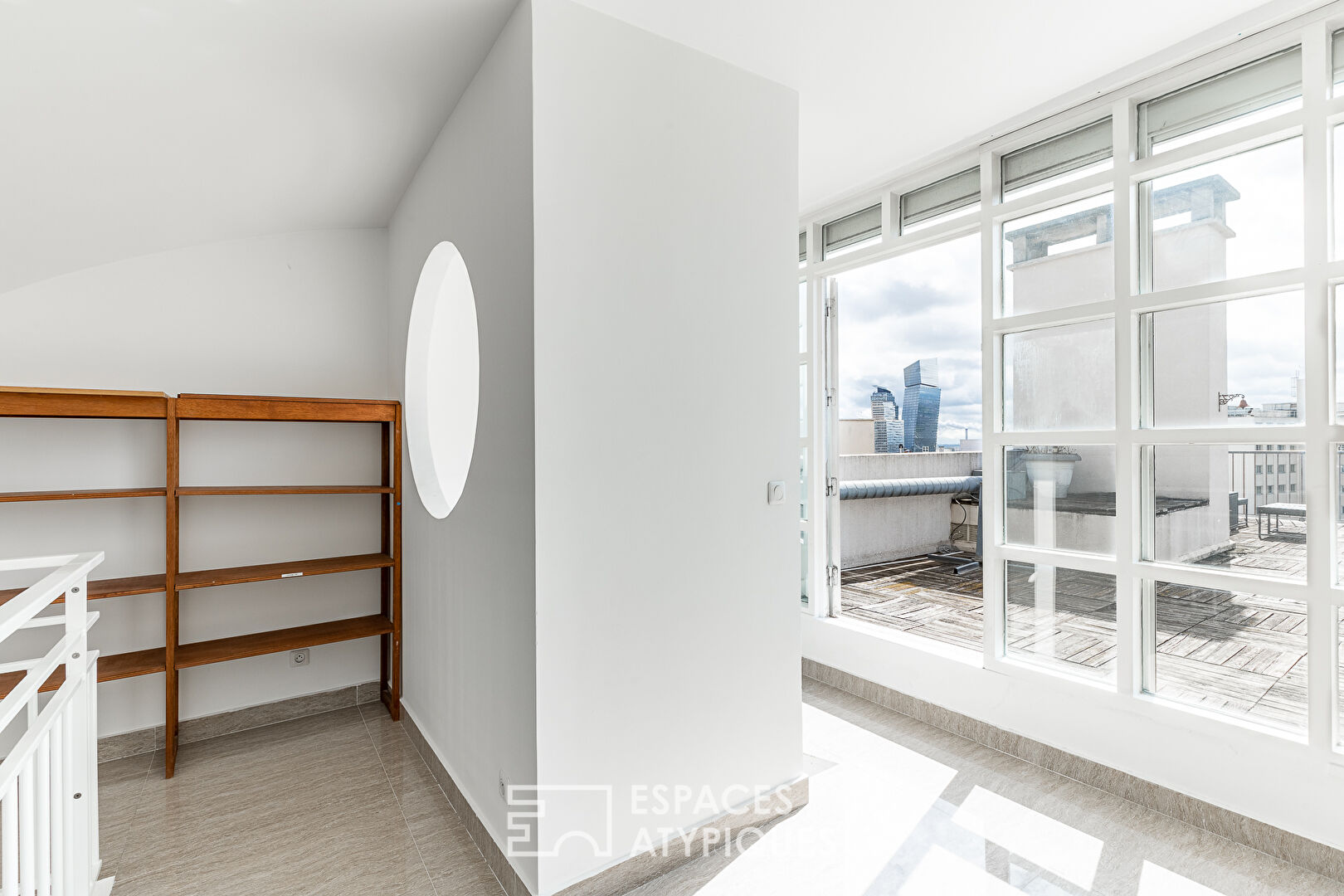 Triplex avec terrasse en dernier étage