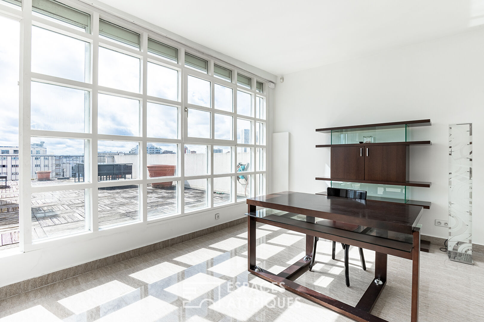 Triplex avec terrasse en dernier étage