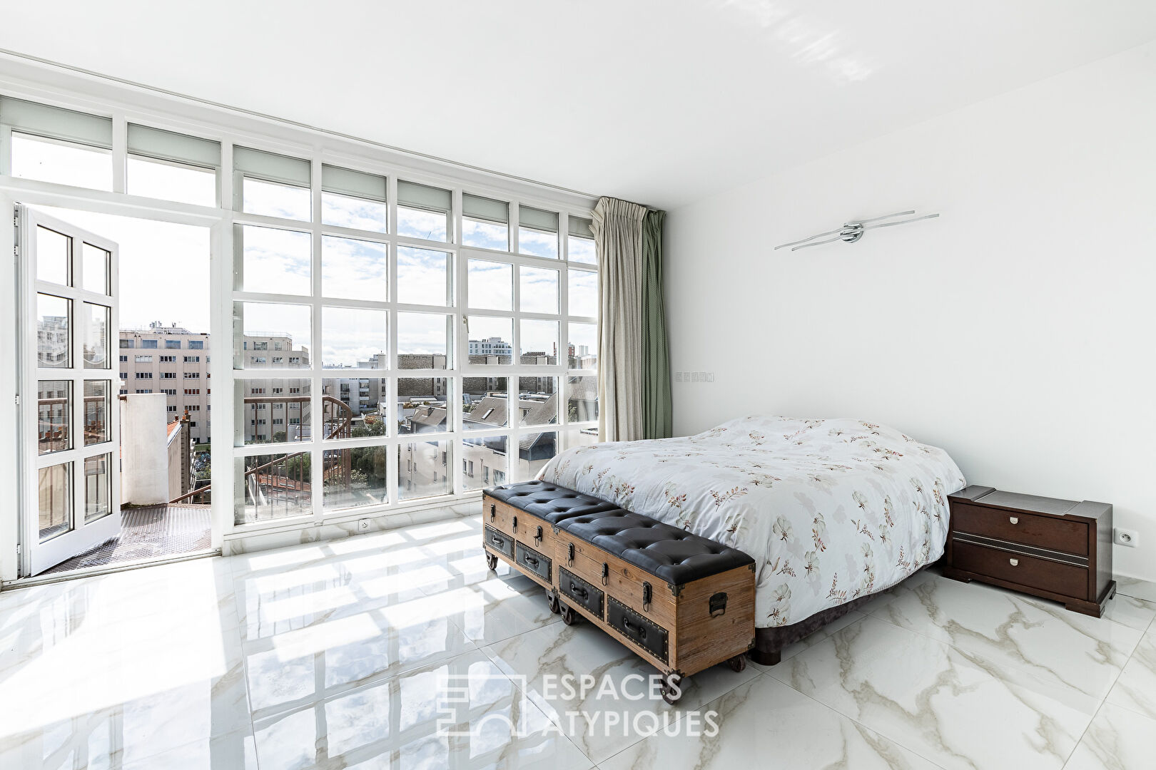 Triplex avec terrasse en dernier étage