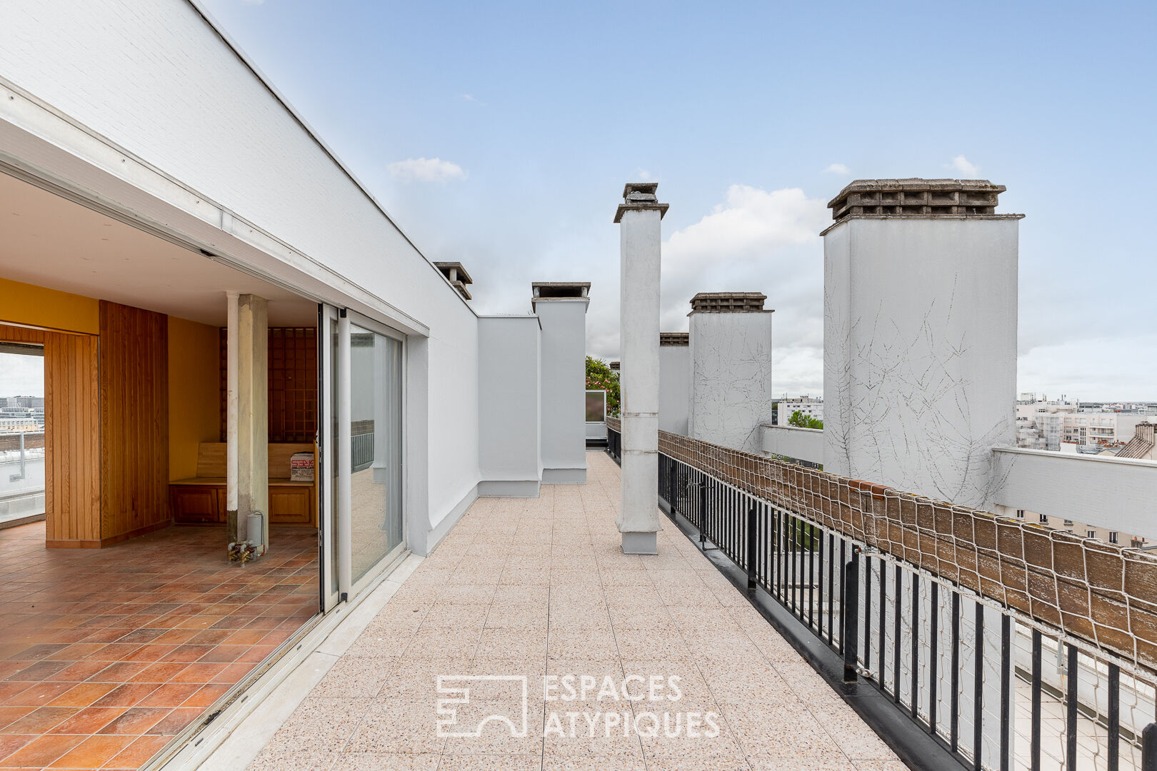 Duplex avec terrasses et jardin en dernier étage à rénover