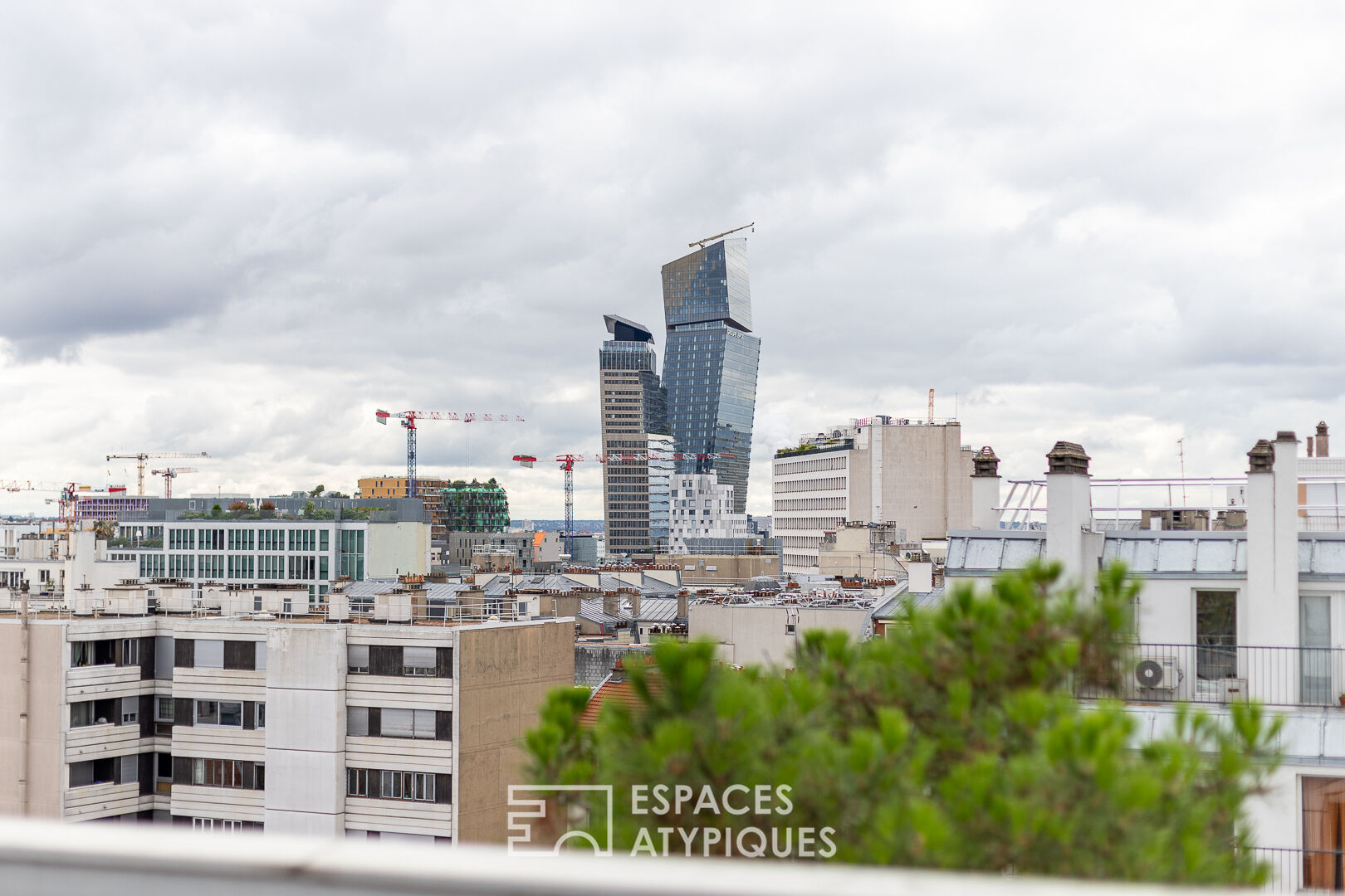 Duplex avec terrasses et jardin en dernier étage à rénover