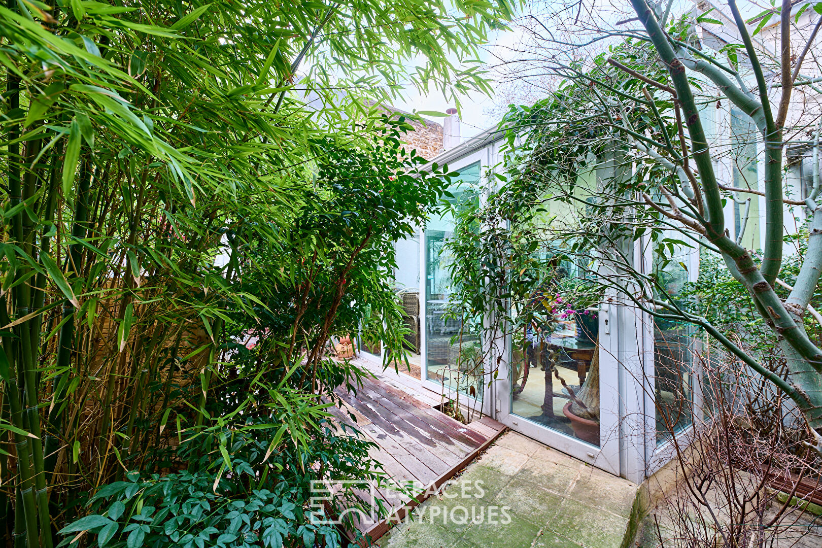 Paris 14ème, face à la coulée verte, maison avec jardin et atelier indépendant