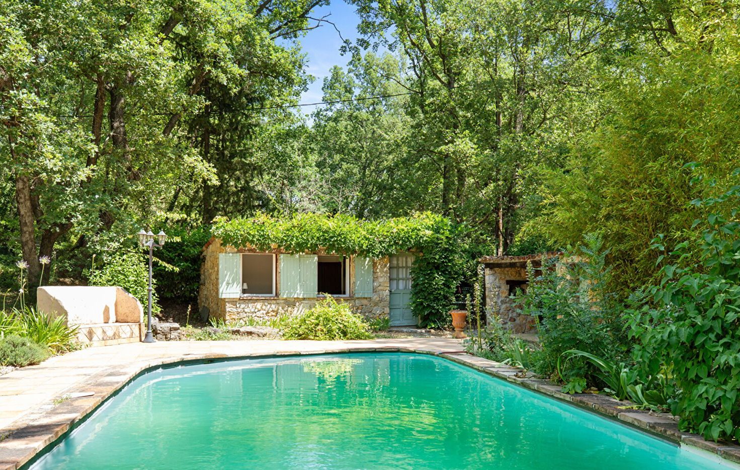 Charming sheepfold on the edge of the forest