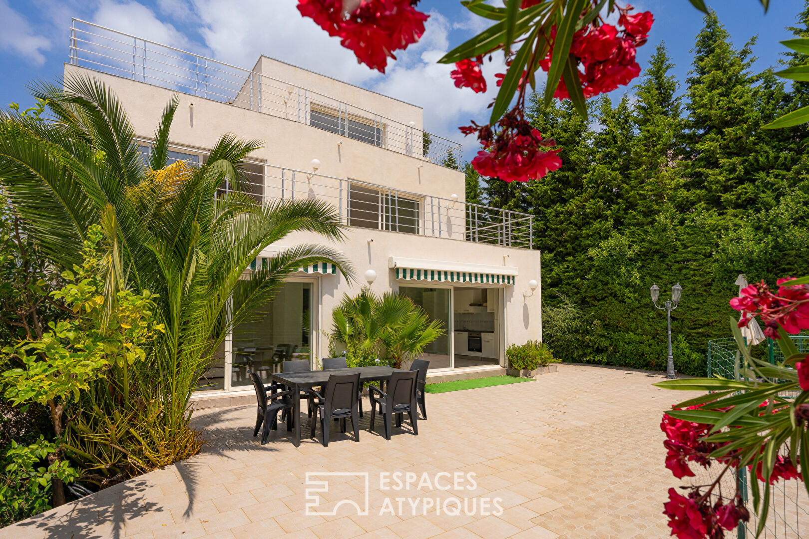 Contemporary villa with three apartments and swimming pool, close to the sea