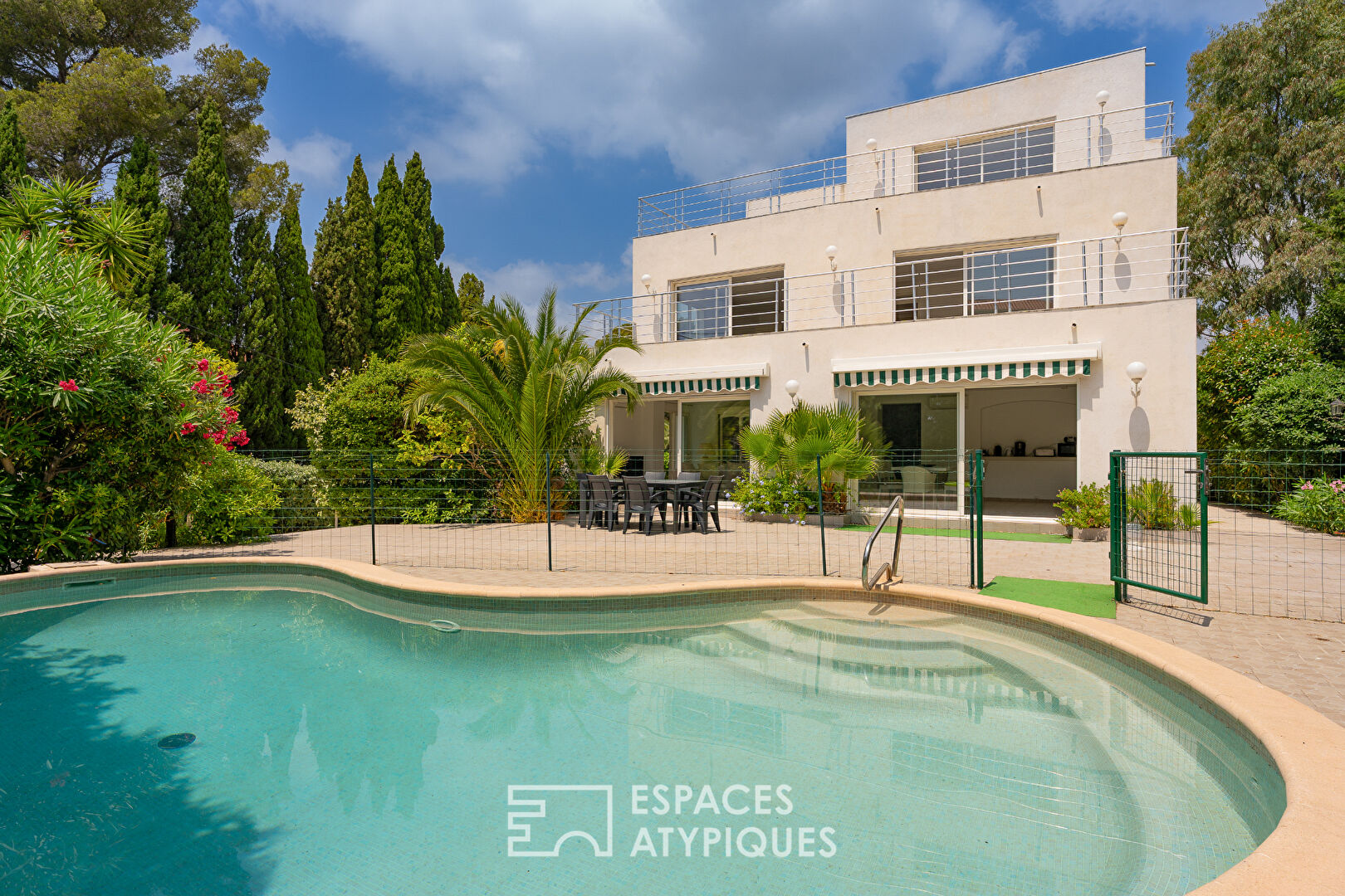 Contemporary villa with three apartments and swimming pool, close to the sea