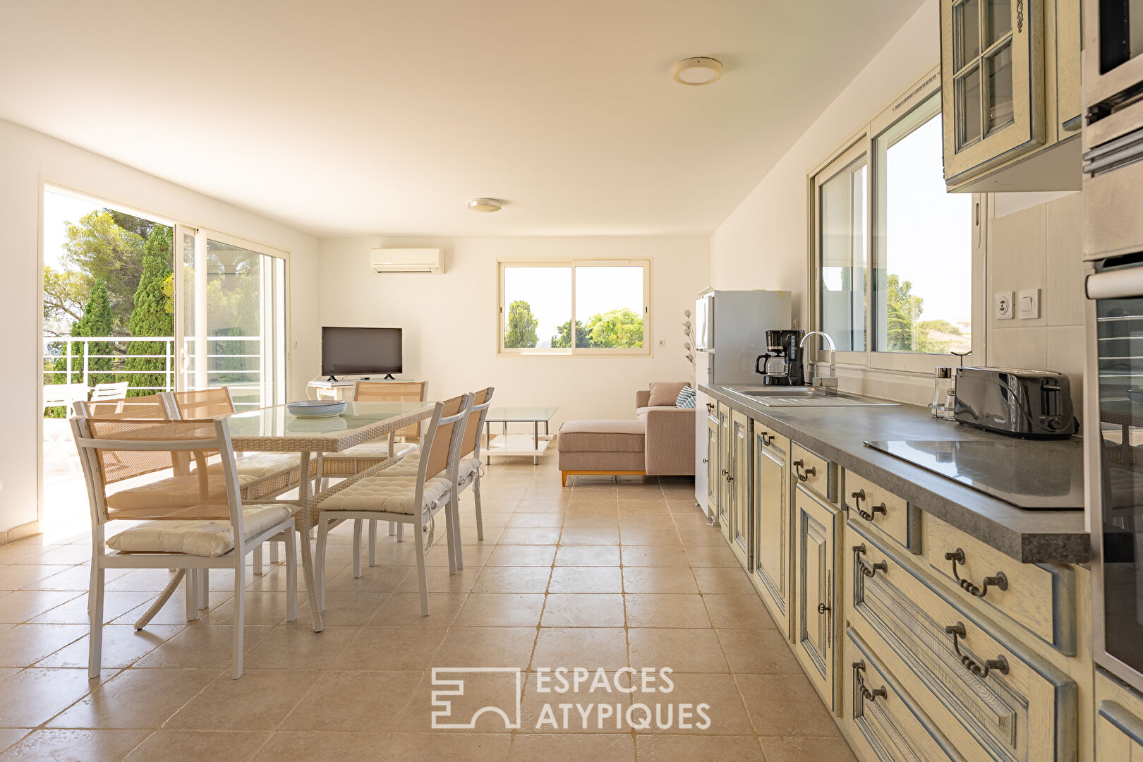 Contemporary villa with three apartments and swimming pool, close to the sea