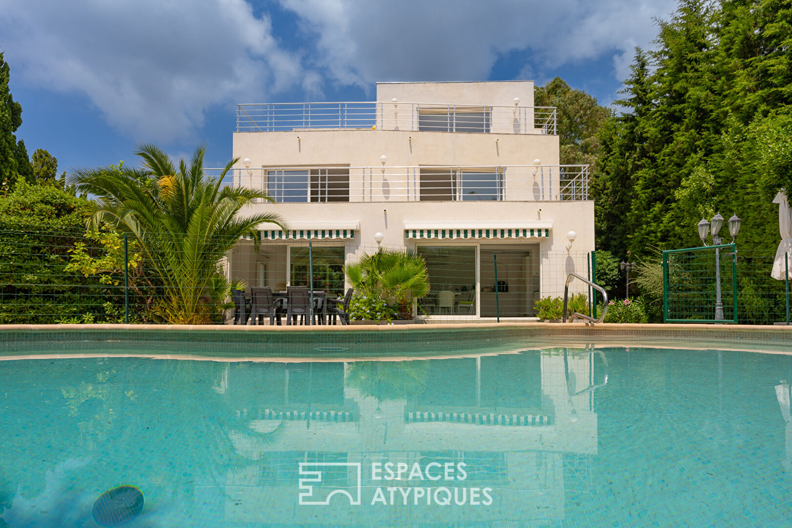 Contemporary villa with three apartments and swimming pool, close to the sea