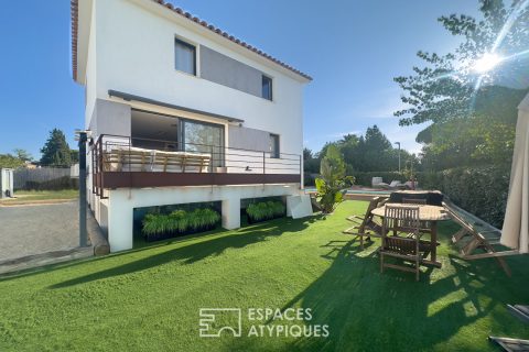 Contemporary house with swimming pool and landscaped garden