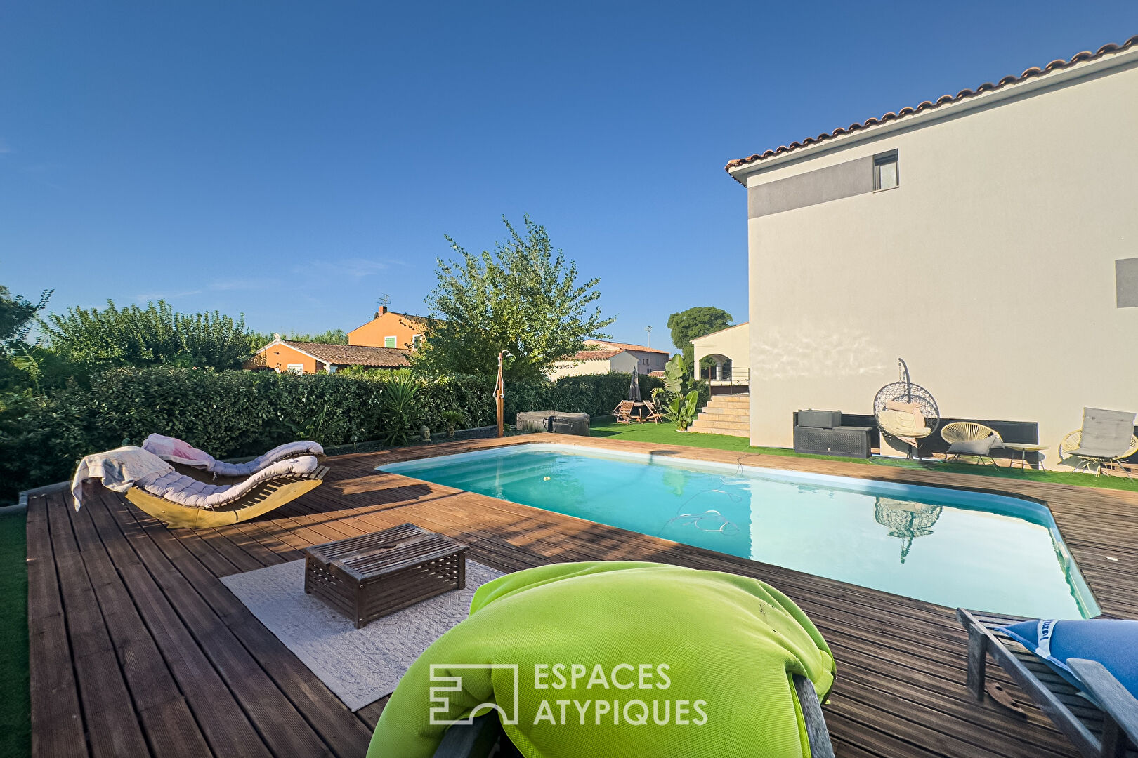 Contemporary house with swimming pool and landscaped garden