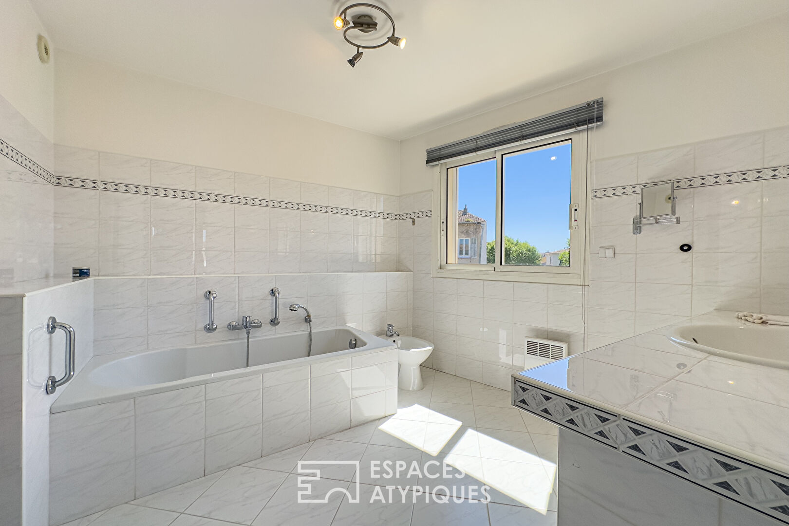 Appartement d’exception de 160m2 pour les amateurs de beaux volumes