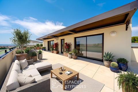 Duplex dernier étage avec rooftop et aperçu mer