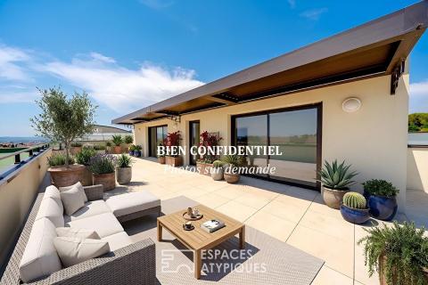 Duplex dernier étage avec rooftop et aperçu mer