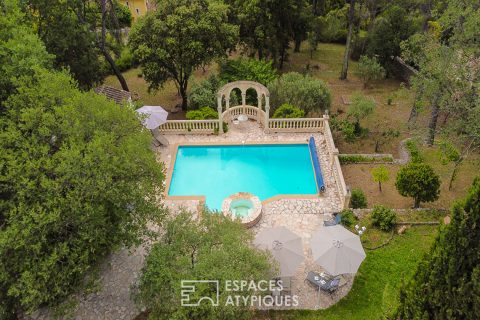 Family villa with swimming pool in a green environment