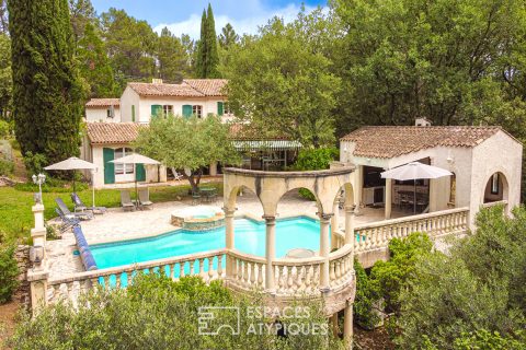 Family villa with swimming pool in a green environment