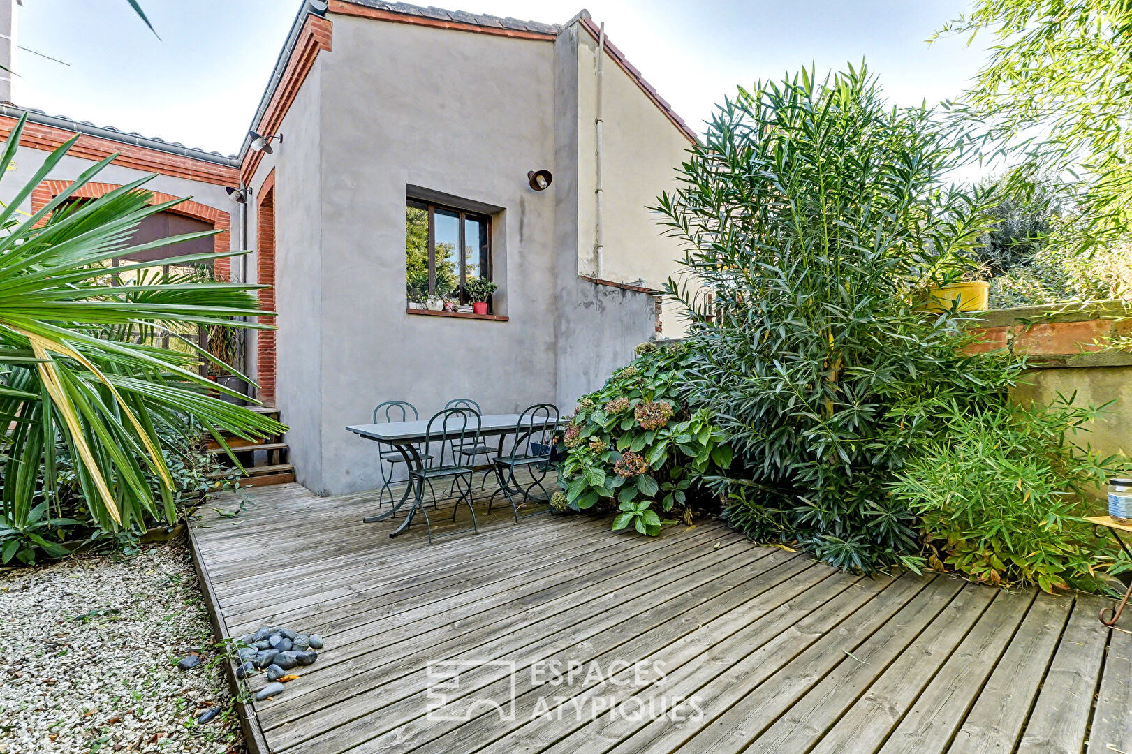 Maison de ville rénovée avec terrasses et jardin au coeur des Minimes
