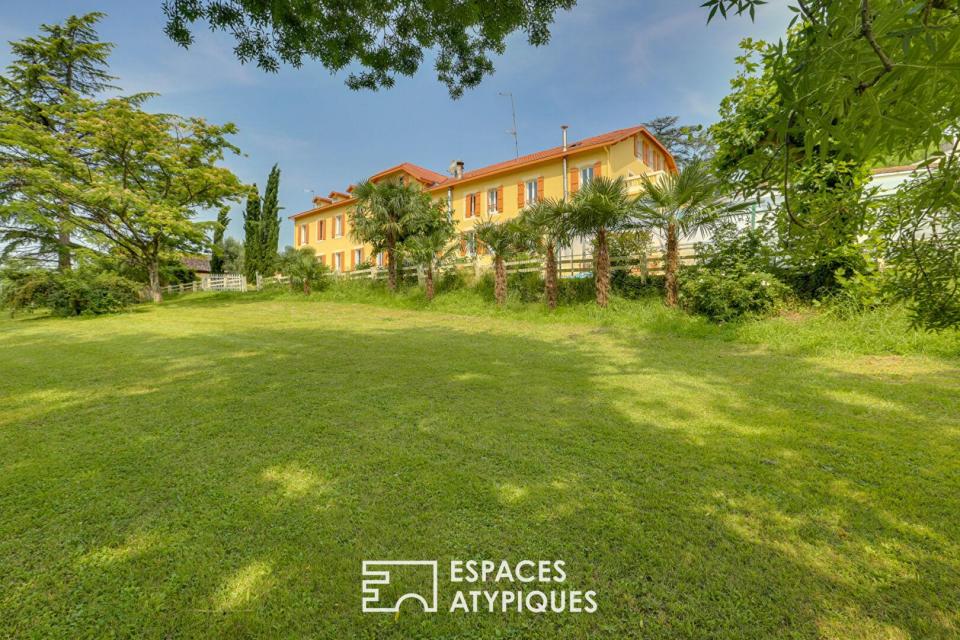 Ensemble immobilier d'exception de 830 m² et son parc arboré