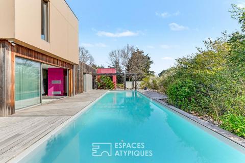 Architect-designed house with views and swimming pool on the hillsides