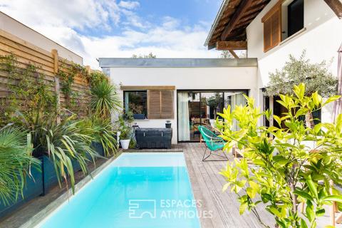 Maison contemporaine réhabilitée dans une ancienne fabrique bas Côté Pavée
