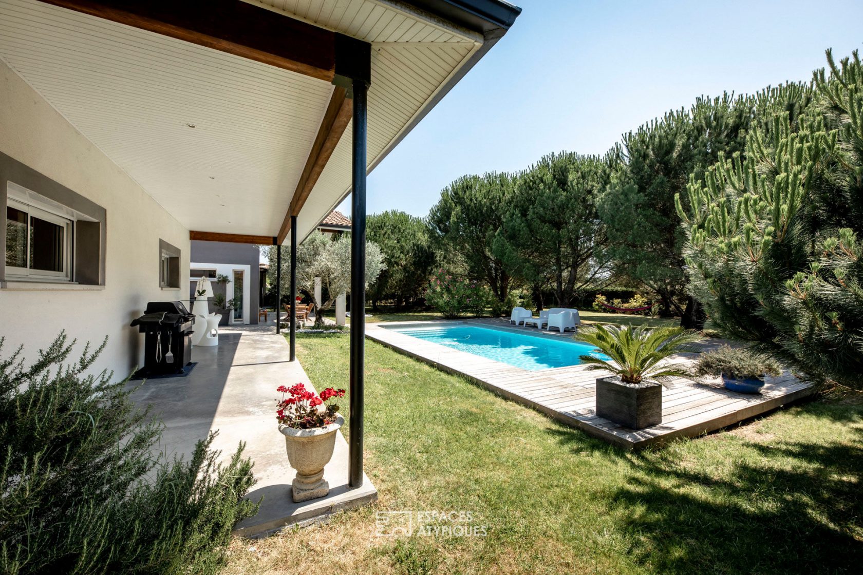 Contemporary house and its landscaped garden