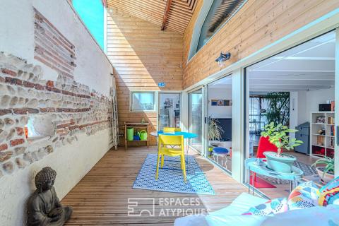 Ancien atelier réhabilité en maison de ville avec patio